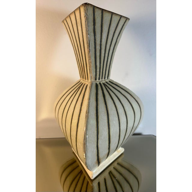 Beautiful, modern style, textured studio pottery vase by artist Gary DiPasquale. Triangular form with textured vertical...