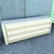This postmodern dresser makes a sculptural statement with its glossy cream laminate finish and bold bullnose drawer...