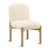 Upholstered in a soft ivory boucle fabric, this dining chair has a gently curved backrest and generously cushioned seat...