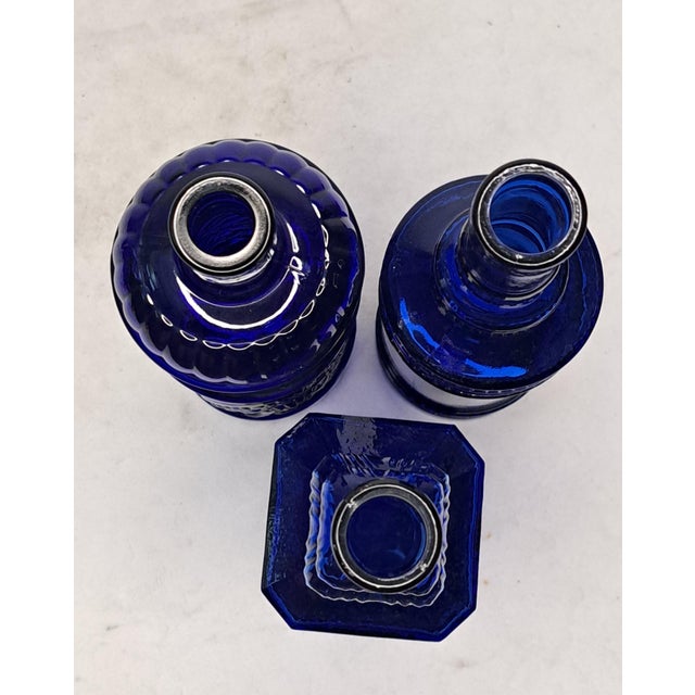 Glass Vintage Cobalt Blue Glass Bottle Vase Lot of 3 Decorative Embossed Glass 12" For Sale - Image 7 of 11