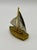 Add a touch of nautical charm to your shelf or desk with this vintage Elgin sailboat desk clock. Crafted in a classic...