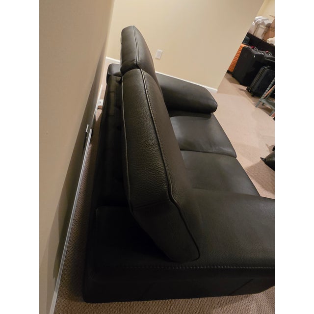 An authentic, beautifully crafted contemporary black sofa from premium French luxury designer Roche Bobois. This high-end...