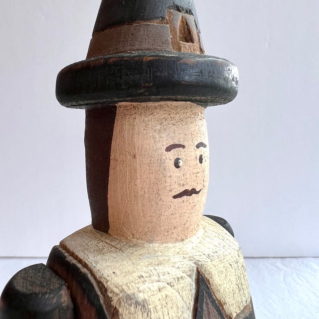 For the folk art wood figurine collector. A hard-to-find Pilgrim Man by Wolf Creek, of Eldora, Iowa. Signed by the artist,...