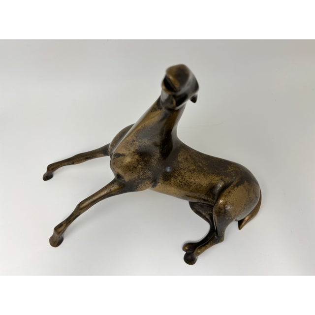 Loet Vanderveen Limited Edition Bronze Reclining Horse Sculpture, Signed & Numbered 230/500 A striking limited edition...