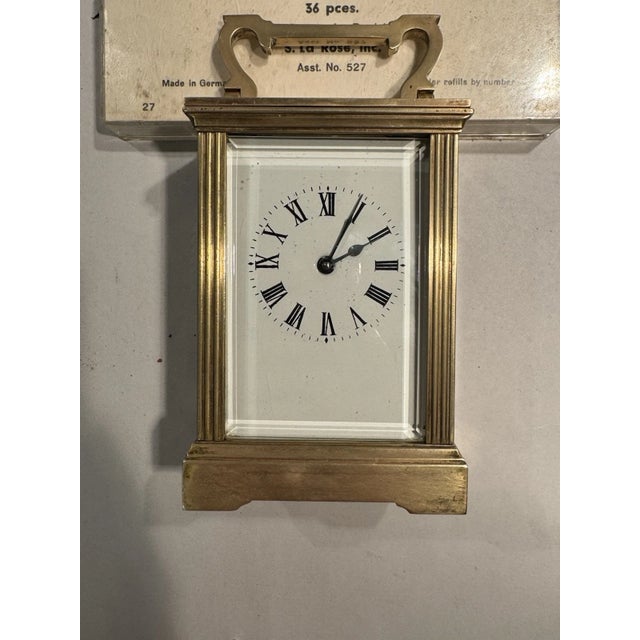 This listing is for an antique French carriage clock. It has a nice brass case and porcelain dial. Maker unknown. Casing...