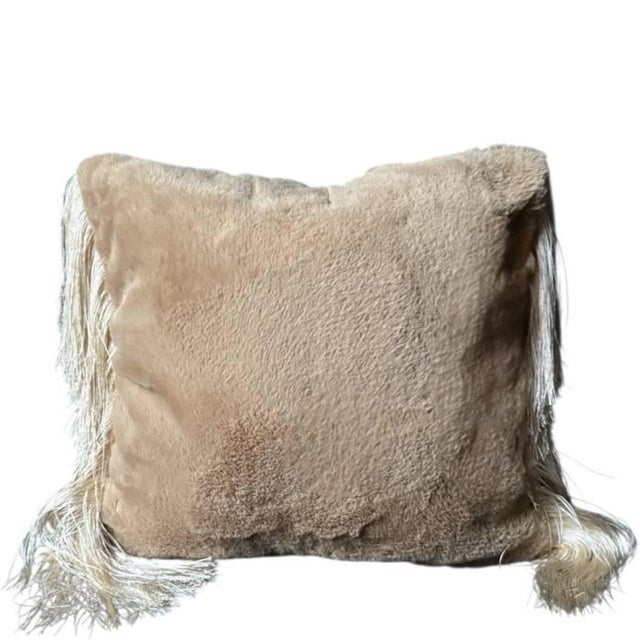 Soft beige Vegan fur with a low pile, giving it a sheared aspect. Trimmed with silky long fringes in ivory Size 40 cm × 40...