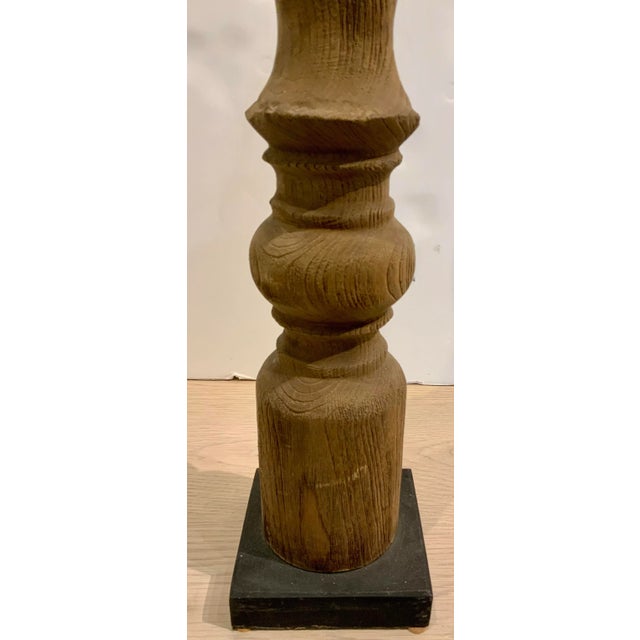 Vintage Asian Wood Artifact Post on Stand, black base, I have two, they are similar but the wood grain is a little...