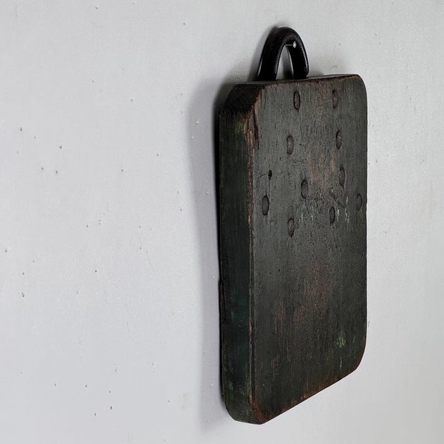 A rare to market Late 19th Century circus pole support. A solid block of wood in dark green with a metal handle for...