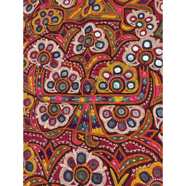 An extraordinary piece of textile art, this antique Indian Gujarati ceremonial door hanging (Toran) dates back to the...