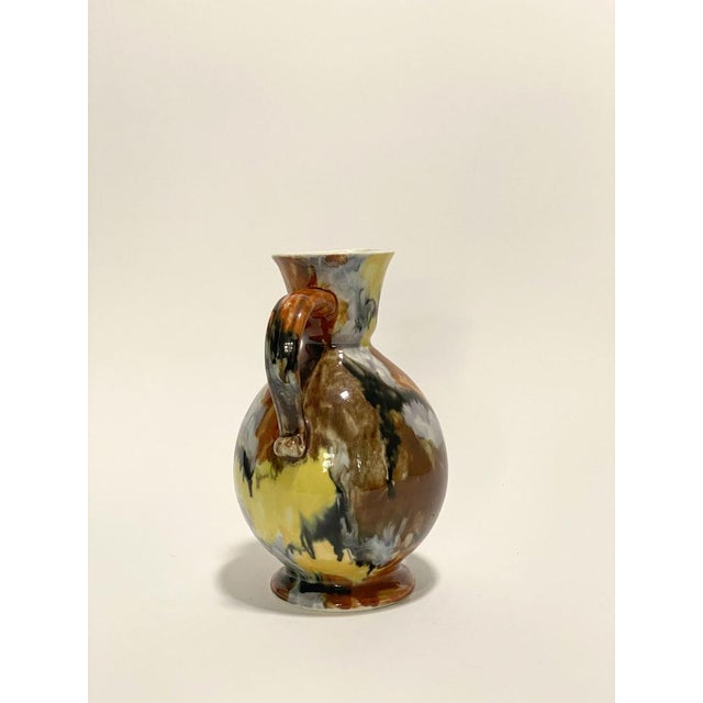 Glazed Ceramic Pitcher from Longwy, 1950s, in Very Good conditions. Designed 1950 to 1959 This piece has an attribution...