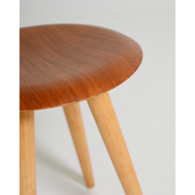 Stool with teak seat and solid beech legs. Scandinavian production, 1950s/1960s. Made in Scandinavia between the 1950s and...