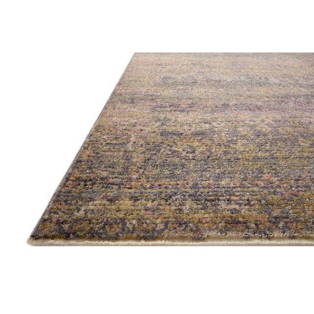 The Bradbury Collection has small-scale motifs that, combined with the rug’s vibrant and varying colors, create eye-...
