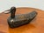 Design Plus Gallery presents a Folk Art Hand Carved Wooden Duck. The sculptural form has a deep brown stained surface,...