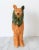 Vintage golden and green ceramic dog figurine. No makers mark. Two chips on ear.
