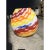 Impressive vase in milky white Murano glass with red, amber, yellow and blue colored reeds. Geometric design in very...