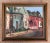 Vintage original oil painting on canvas board of a street scene including row homes and a small black dog. Painting...