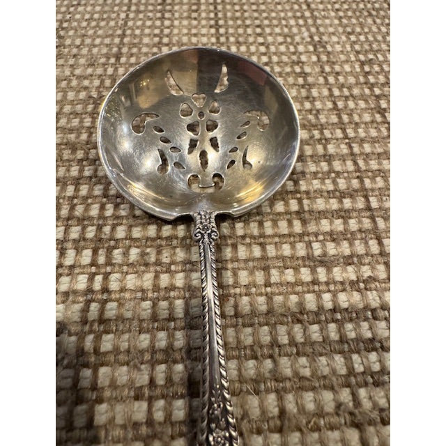 This Listing is for a Pierced Sifter Spoon, Candy, Serving Spoon in the "Cambridge" Pattern by Gorham Sterling. The Solid...