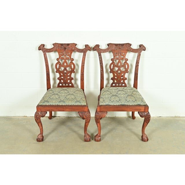 An outstanding pair of Chippendale or Georgian style side chairs or dining chairs In the manner of Baker Furniture USA,...