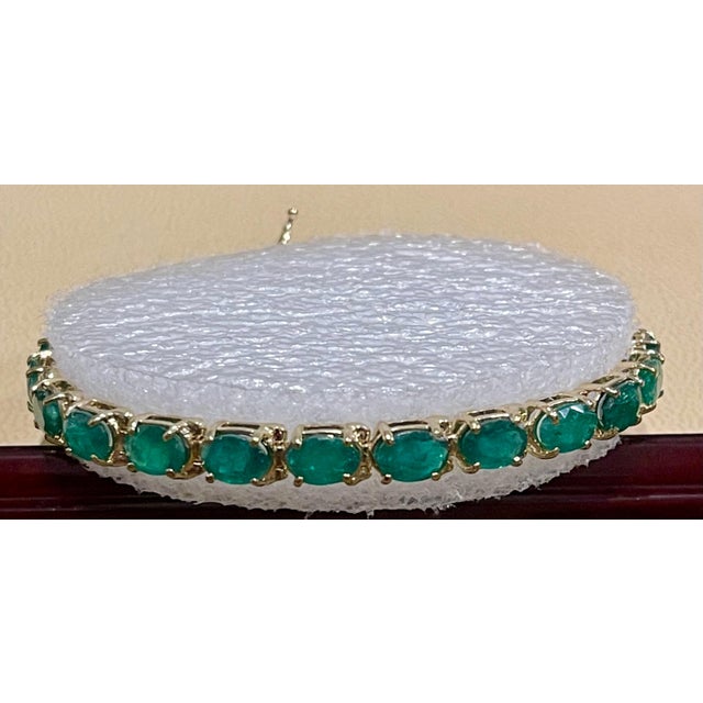 This exceptionally affordable Tennis bracelet has 29 stones of oval Emeralds . Total weight of the Emeralds is...