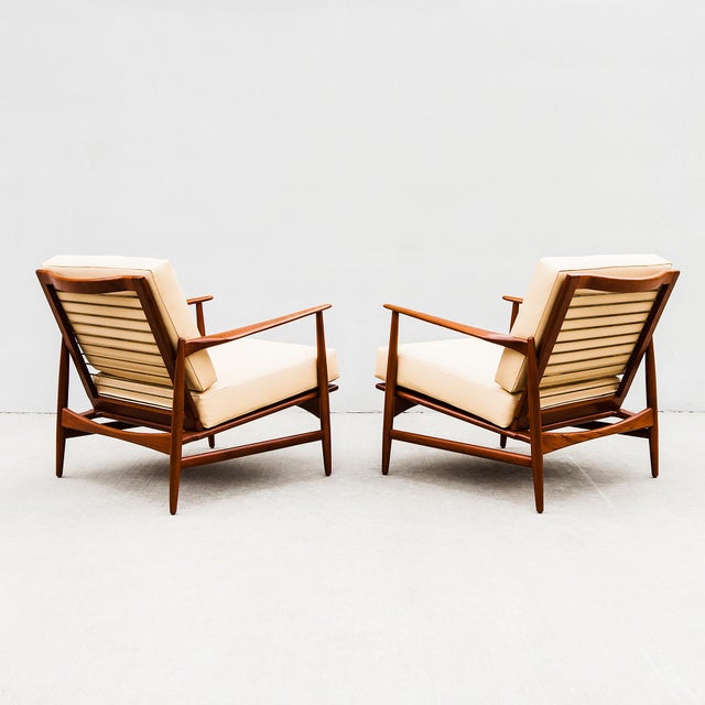 Fully restored Scandinavian mid century modern lounge chairs by Ib Kofod-Larsen, made in Denmark by Selig c. 1960s....