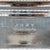 A 1975 club trophy in the form of a long, two-handled silverplate bread tray by Poole Silver Co. The center is engraved in...