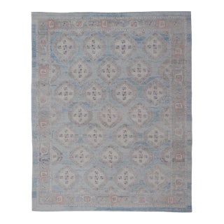 All-Over Tribal Motifs Design Light Blue With Hints of Orange Turkish Oushak Rug For Sale
