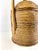 Mid-century table lamp crafted from tightly woven rattan with sculptural bamboo-form framing and warm brass hardware. The...
