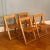 A beautiful set of four mid-20th century slat seat folding chairs in the style of Aldo Jacober for Alberto Bazzani...