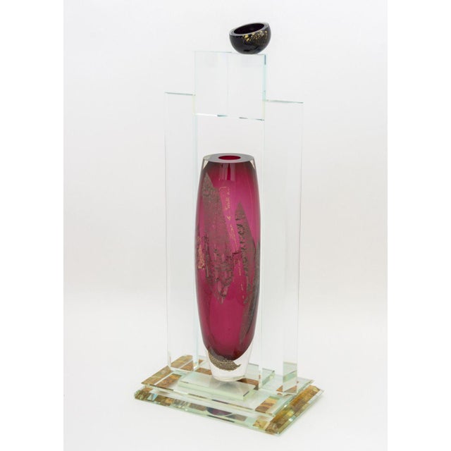 Postmodern Art Glass Vase, 1998, with magenta colored central glass with geometric clear glass design, illegibly signed...