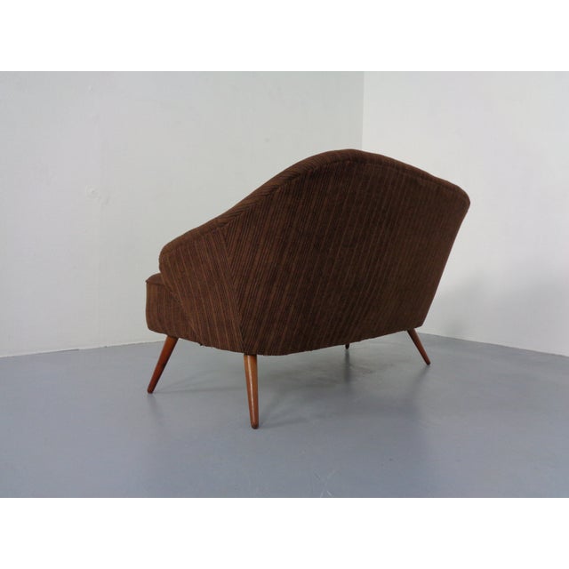 Sofa from the 60s. Original cover with brown corduroy. Upholstery with spring core. Dimensions 2-seater sofa: seat height...