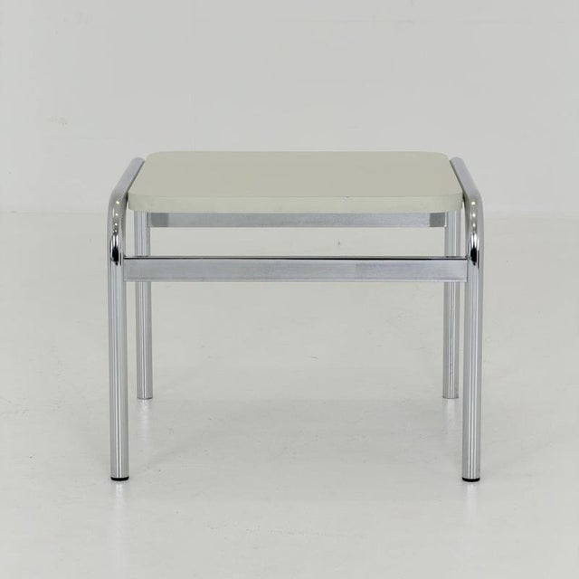 A beautiful example of Swiss modernist furniture design, this original Girsberger table features a clean, geometric...