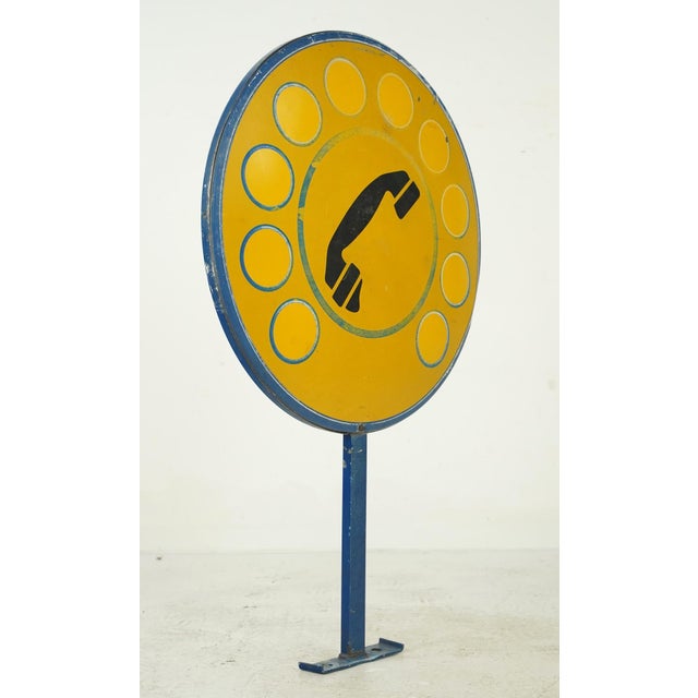 Mid Century Italian double sided public telephone sign made of a steel blue painted base and a round yellow aluminum sign...
