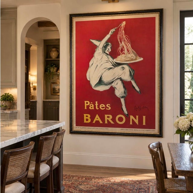 A substantial framed reproduction (frame measurements 54 inches x 41.5 inches) of the famous 1921 French Pâtes Baroni...