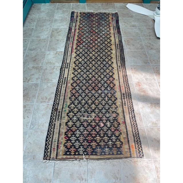 Give it the layered look! This lovely aged Kilim would make a great stair or hall runner or add to the tapestry or you...