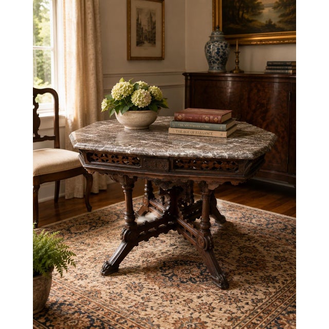 Bring late 19th-century elegance into your space with this exceptional American Victorian Eastlake center parlor table,...