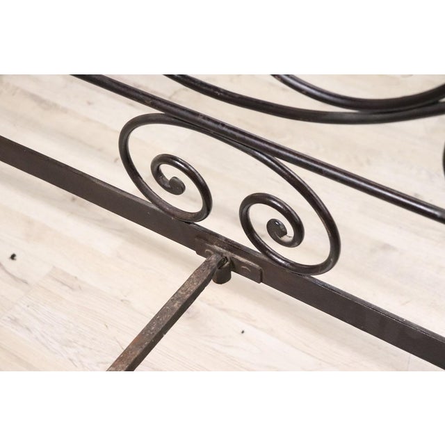 Italian wrought iron bed dating back to the first half of the 19th century. this bed features elaborate wrought iron...