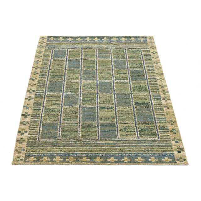 Elevate your space with this sophisticated modern flatweave wool rug, inspired by timeless Swedish minimalist design....