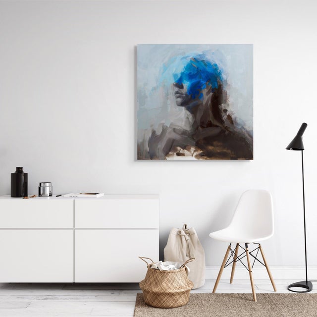 This artwork features a figure rendered in soft, fluid brushstrokes, where shades of blue dominate the composition,...