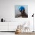 This artwork features a figure rendered in soft, fluid brushstrokes, where shades of blue dominate the composition,...