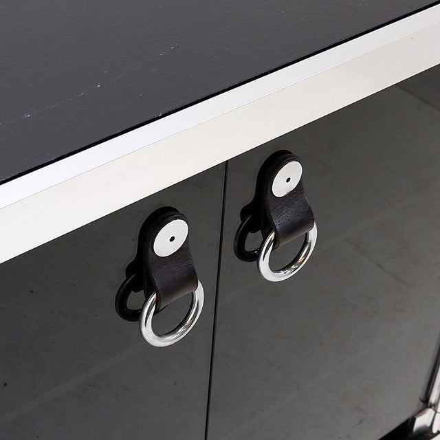 Sideboard by Guido Faleschini for Hermès, 1970s Measures : 100x46cm H: 86cm Materials : Wood - glass - steel - leather -...