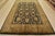 A traditional Agra rug is hand-knotted with fine wool on a cotton foundation. This area rug features a botanical design...