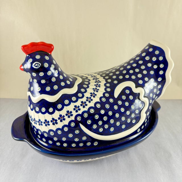 A Stoneware pottery Hen-Shaped Covered Baker, handcrafted and painted by artisans working for the renowned Zaklady...