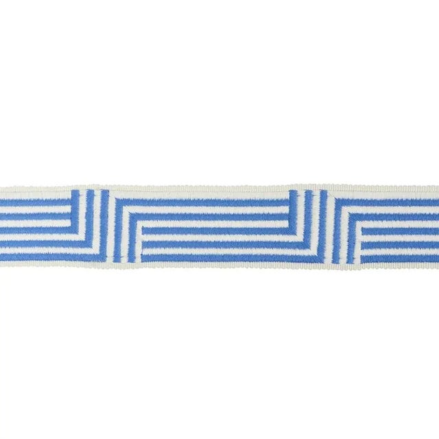 This versatile, Art Deco-like geometric tape boasts embroidered rows of satin stitching for a gleaming, graphic flourish....