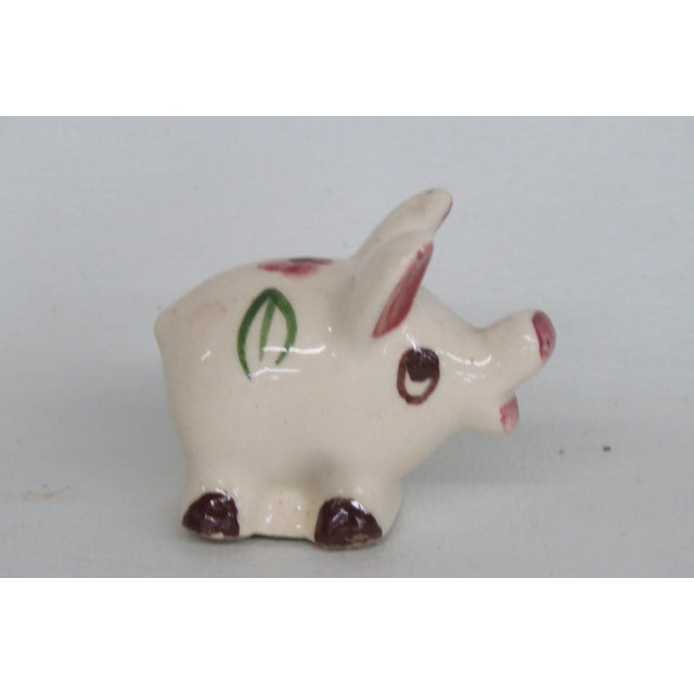 This darling Miniature Pig Figurine is made of ceramic. This lovely little pig presents a cozy mid-century folk art style;...