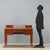Umbertina walnut desk. Top with black leather insert and backsplash with side drawers and a central balustrade. Five...