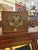 Late 1900s antique Empire dressing mirror. Fashioned of walnut and bronze finish metal. The mirror is in excellent antique...