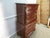 Item 87867: Colonial Furniture solid cherry chest of drawers. Age: 1990's. Details: Dovetailed drawers. Condition: Very...