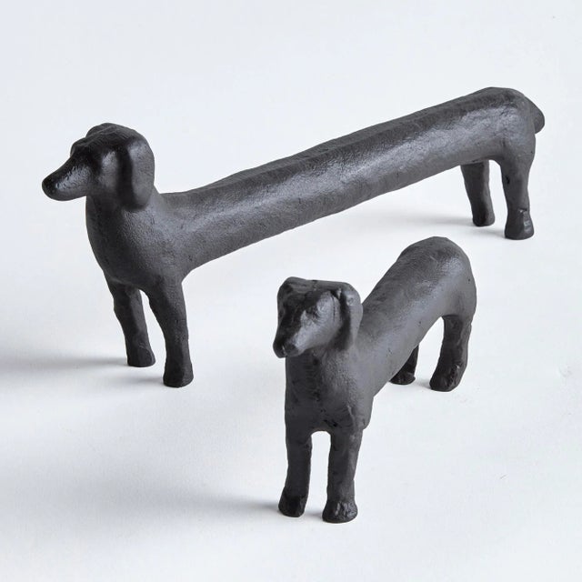 Made of a heavy cast aluminum, this set of regal dachshund sculptures are worthy of a prime bookshelf spot. With abstract,...