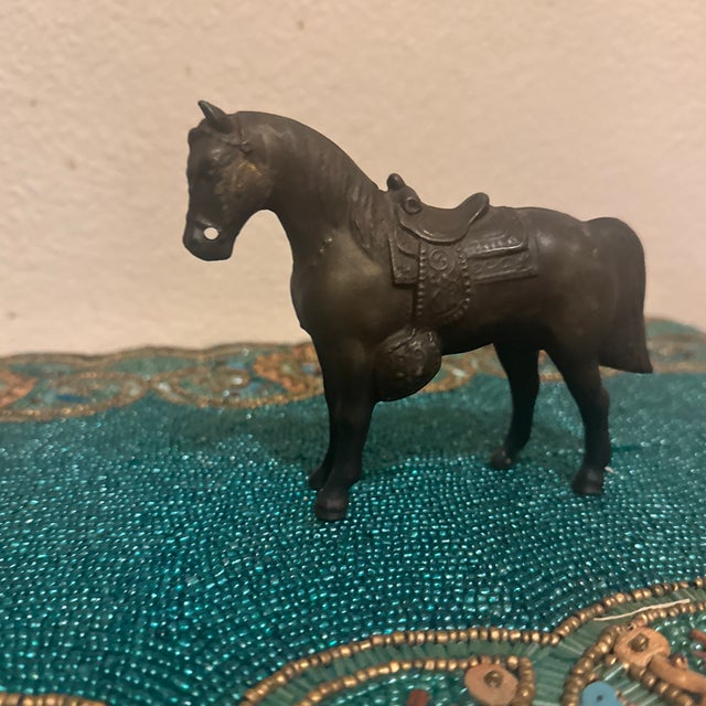Add a touch of nostalgic Western Americana to your shelves with this charming mid-century hollow-cast metal horse...