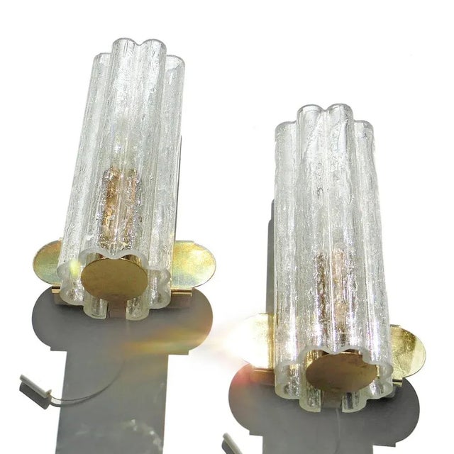 Original set of mid-century modern sconces / wall lamps from the 1970s. Designed and manufactured by doria leuchten...
